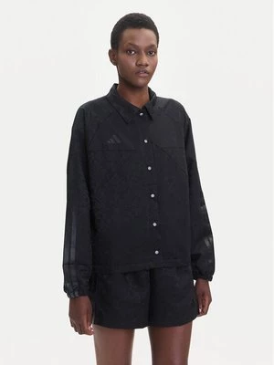 Obrázek produktu adidas Bunda pro přechodné období Tiro x Common Goal Coaches JL7647 Černá Loose Fit