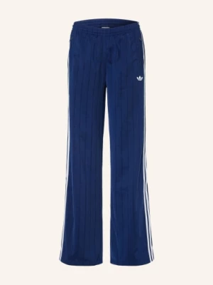 Obrázek produktu Adidas Originals Tepláky Firebird Loose tmavě modrá / bílá