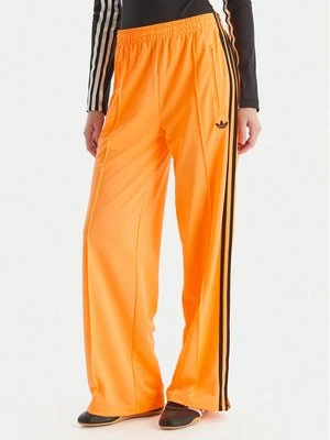 Obrázek produktu adidas Teplákové kalhoty adicolor Classic Firebird JY2694 Žlutá Loose Fit