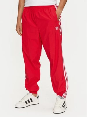 Obrázek produktu adidas Teplákové kalhoty Adicolor Woven Firebird IT2498 Červená Regular Fit