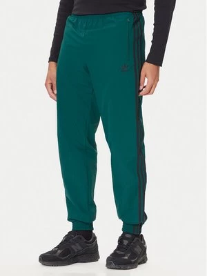 Obrázek produktu adidas Teplákové kalhoty adicolor Woven Firebird JY1335 Zelená Regular Fit