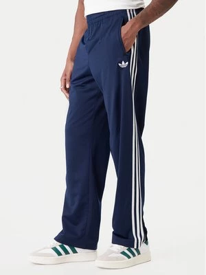 Obrázek produktu adidas Teplákové kalhoty Firebird KD8316 Tmavomodrá Loose Fit