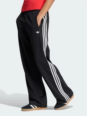 Obrázek produktu adidas Teplákové kalhoty Pinstripe Firebird KS6787 Černá Loose Fit
