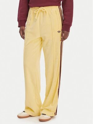 Obrázek produktu adidas Teplákové kalhoty Terry Towel Firebird KQ6662 Žlutá Loose Fit
