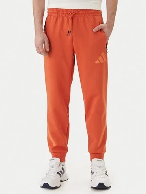 Obrázek produktu adidas Teplákové kalhoty Z.N.E. KE4686 Oranžová Regular Fit