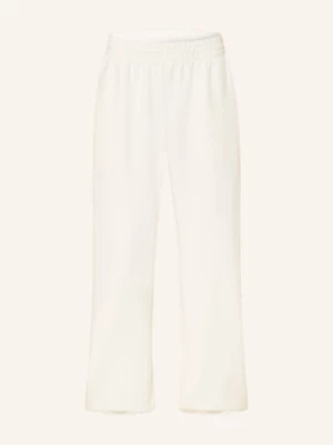 Obrázek produktu Adidas Tepláky Soft Lux Loose režná