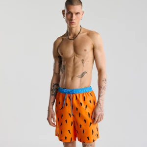Obrázek produktu Cropp - Koupací šortky s celoplošným potiskem The Flintstones - oranžová