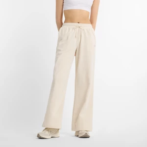 Obrázek produktu Dámské kalhoty New Balance WP51503LIN – béžové