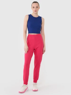 Obrázek produktu Dámské tepláky typu jogger - růžové 4F