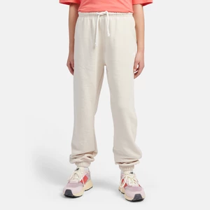 Obrázek produktu Dětské kalhoty New Balance LAKG0058LIN – béžové