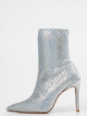 Obrázek produktu Kotníková obuv na vysokém podpatku Stuart Weitzman