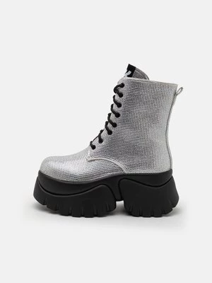 Obrázek produktu Kotníkové boty na platformě Koi Footwear