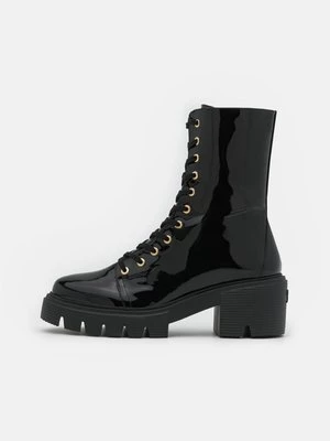 Obrázek produktu Kotníkové boty na platformě Stuart Weitzman