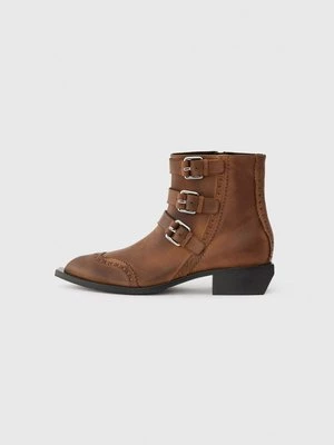 Obrázek produktu Kovbojské/motorkářské kotníkové boty Moschino