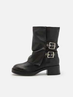 Obrázek produktu Kovbojské/motorkářské kotníkové boty Steve Madden