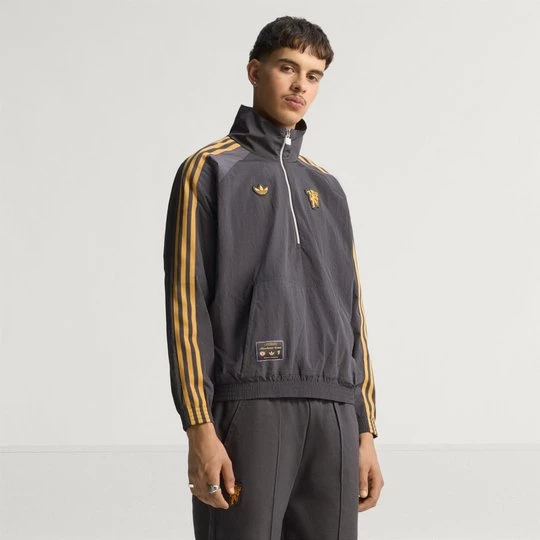Obrázek produktu Bunda Manchester United Terrace Icons spolovičním zipem Adidas
