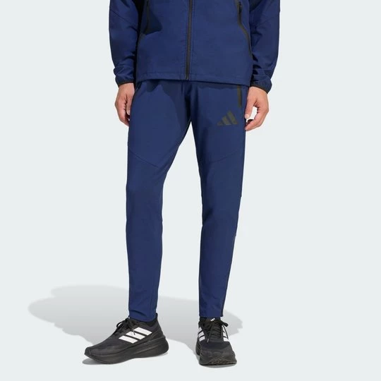 Obrázek produktu Kalhoty Tiro Travel Woven Pants Adidas