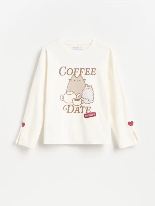 Obrázek produktu Reserved - Bavlněné tričko s dlouhými rukávy Pusheen - krémová