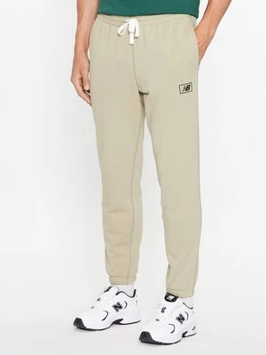 Obrázek produktu New Balance Teplákové kalhoty NB Essentials Sweatpant MP33509 Zelená Regular Fit