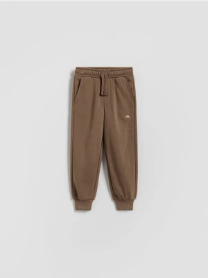 Obrázek produktu Reserved - Bavlněné jogger kalhoty - hnědá