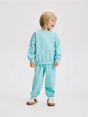Obrázek produktu Reserved - Bavlněné jogger kalhoty - mátově zelená