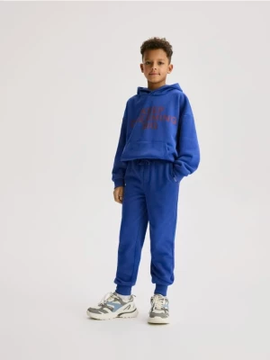 Obrázek produktu Reserved - Bavlněné jogger kalhoty - modrá