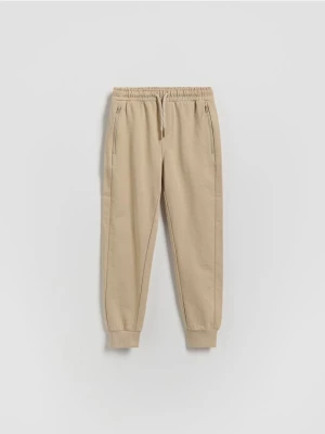 Obrázek produktu Reserved - Bavlněné kalhoty joggers - béžová