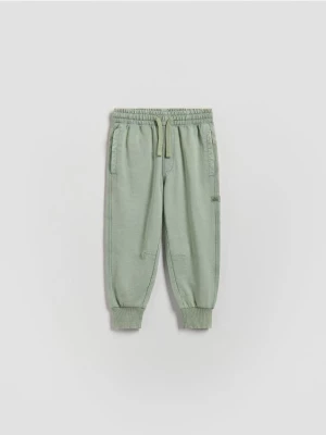 Obrázek produktu Reserved - Bavlněné kalhoty joggers - bledá zelená