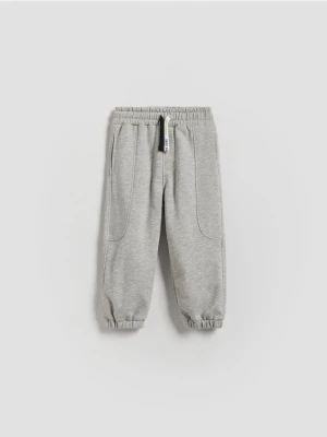 Obrázek produktu Reserved - Bavlněné kalhoty joggers - světle šedá