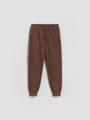 Obrázek produktu Reserved - Bavlněné kalhoty joggers - tmavě hnědá