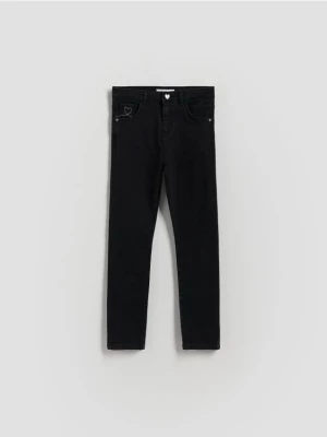 Obrázek produktu Reserved - Jeggings slim fit s knoflíkem ve tvaru srdce - šedá
