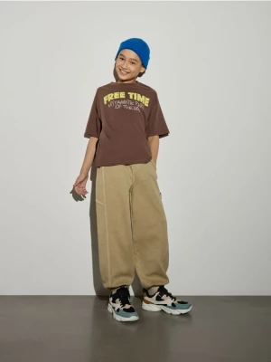 Obrázek produktu Reserved - Joggery baggy s efektem seprání - světle olivová