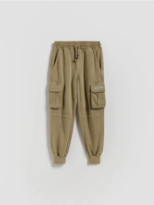 Obrázek produktu Reserved - Kalhoty cargo joggers se sepraným efektem - zelená