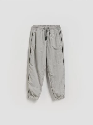 Obrázek produktu Reserved - Ortalionové jogger kalhoty - světle šedá