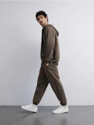 Obrázek produktu Reserved - Tepláky comfort fit - pudrově zelená