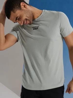 Obrázek produktu Sinsay - Bavlněné tričko s nápisem Caution Hot - mentolová
