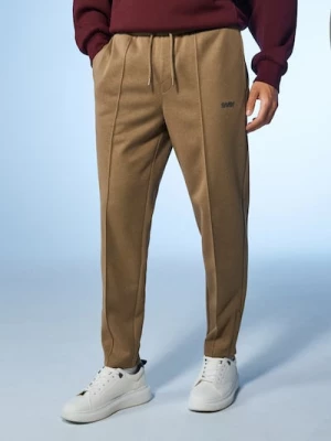 Obrázek produktu Sinsay - Kalhoty tapered fit - béžová
