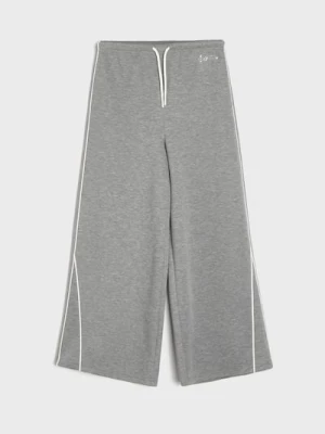 Obrázek produktu Sinsay - Oversize sportovní kalhoty s kontrastními pruhy Active - šedá