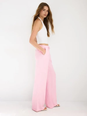 Obrázek produktu Stradivarius Splývavé Kalhoty Se Vzhledem Lnu Pastel Pink