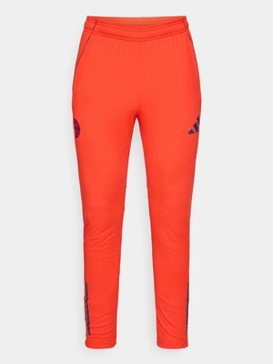 Obrázek produktu Teplákové kalhoty Adidas červená