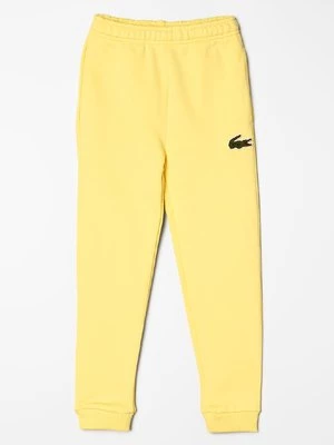 Obrázek produktu Teplákové kalhoty Lacoste žlutá