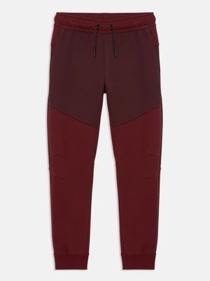 Obrázek produktu Teplákové kalhoty Nike bordeaux
