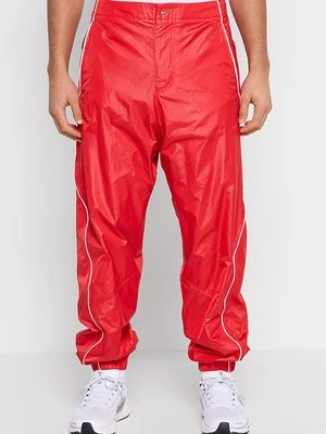 Obrázek produktu Teplákové kalhoty Nike červená