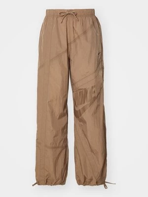 Obrázek produktu Teplákové kalhoty Nike hnědá