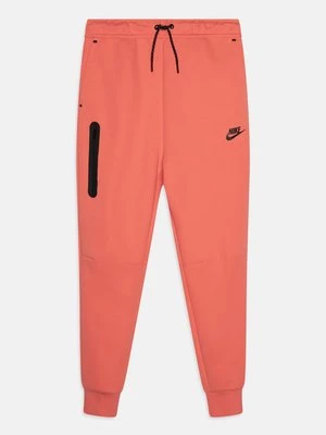 Obrázek produktu Teplákové kalhoty Nike korálová