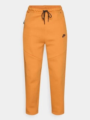 Obrázek produktu Teplákové kalhoty Nike oranžová