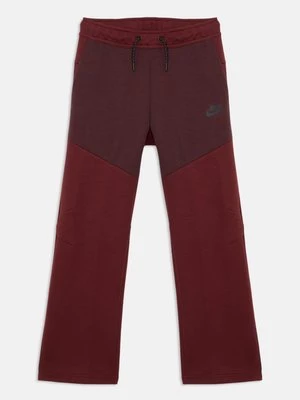Obrázek produktu Teplákové kalhoty Nike tmavě červená