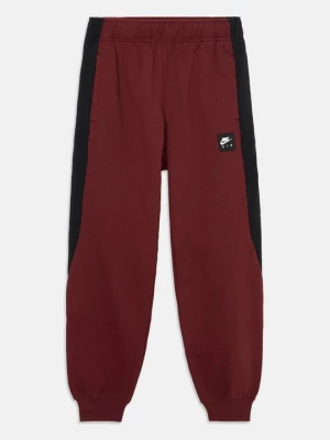 Obrázek produktu Teplákové kalhoty Nike tmavě červená