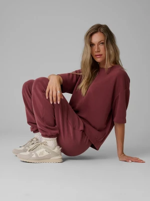 Obrázek produktu 4F Teplákové kalhoty joggery s modalem dámské - burgundské červený