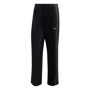 Obrázek produktu ADIDAS ORIGINALS Kalhoty 'Firebird' zlatá / černá